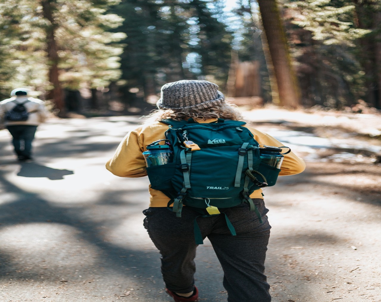 Hiker with a prepared backpack setting out on a hike - Don't Love it to Death